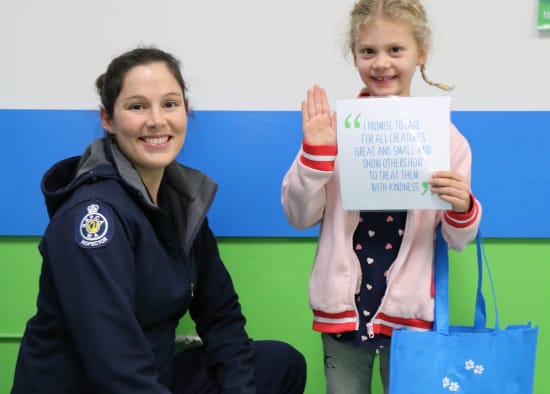 Junior Rescue Officer taking pledge with RSPCA WA Inspector