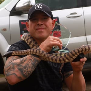 Mick Fullerton and Clio the python