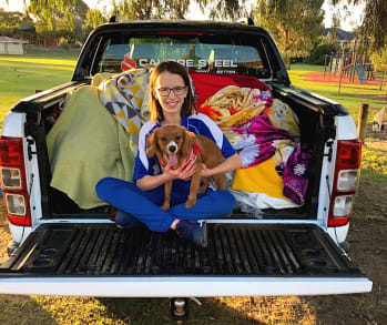 RSPCA WA Junior Ambassador Mia Beatty with a ute-load of donations for animals in need.