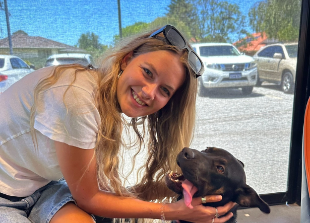 Ambassador Rachel Payne with a dog