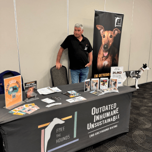 2025 AWA Volunteer winner Alan Dolphin - standing at free the hounds stall