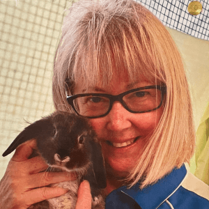 2025 AWA volunteer winner Christine OShea holding bunny