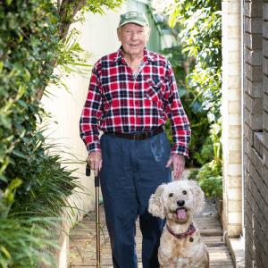 2025 AWA animal winner Molly with owner Ron in backyard