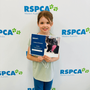 2025 AWA youth winner Evelyn Hughes holding certificate